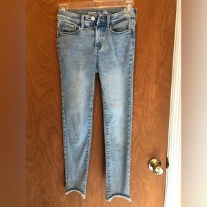 Highrise Rockstar jeggings; adjust. waistband; excellent condition; never worn